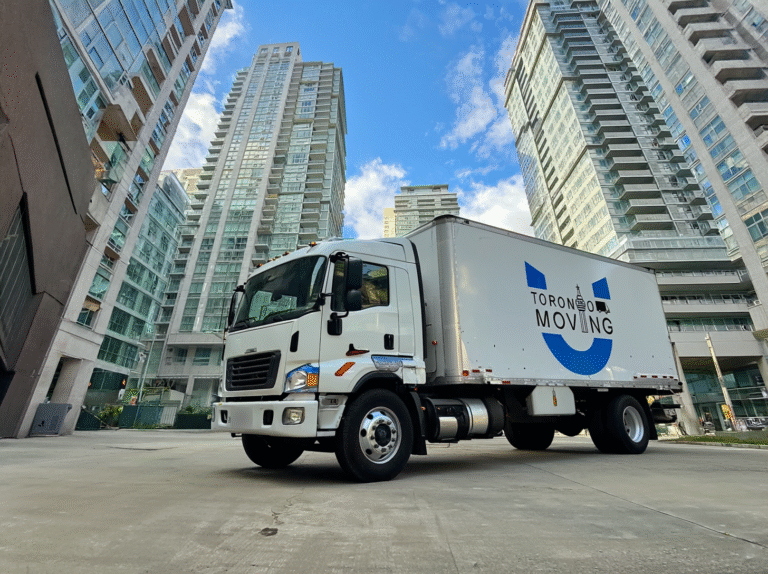 Toronto Moving truck parked outside high-rise condos during a scheduled condo move
