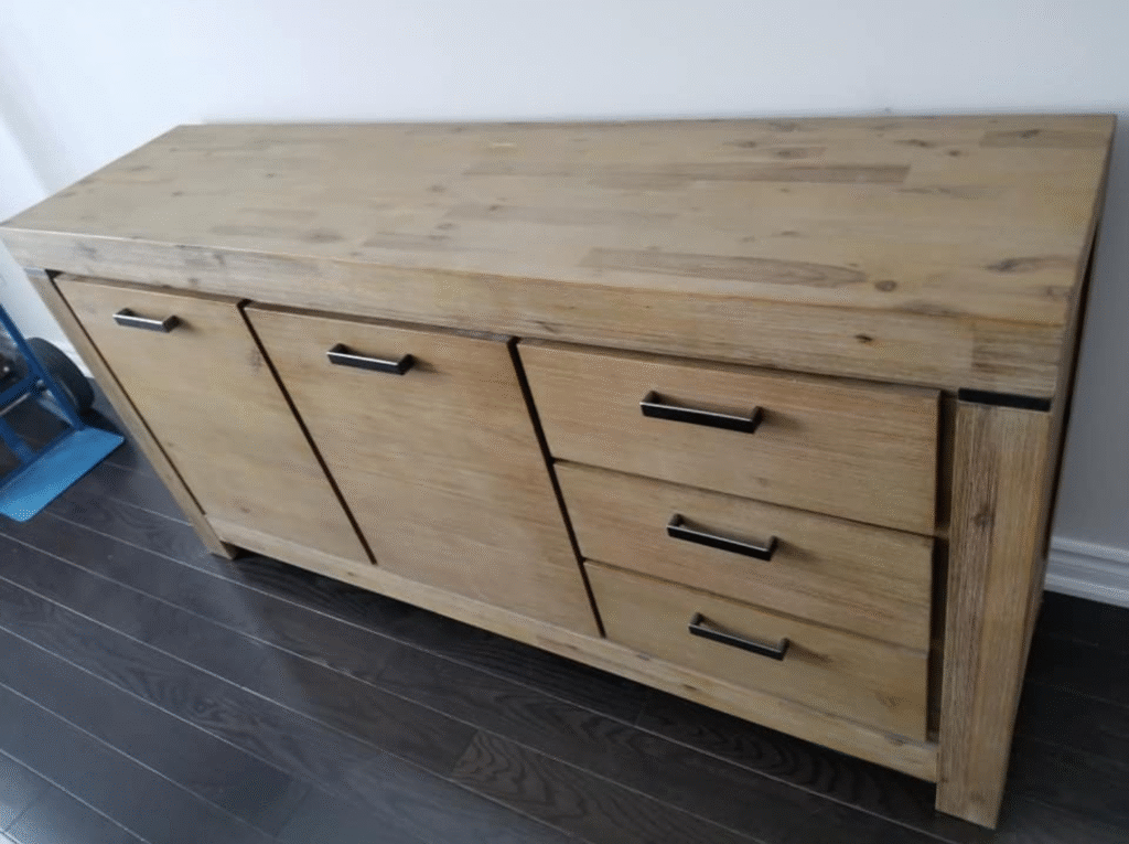Solid wood sideboard before packing, showing surfaces that will be protected during a Toronto move.