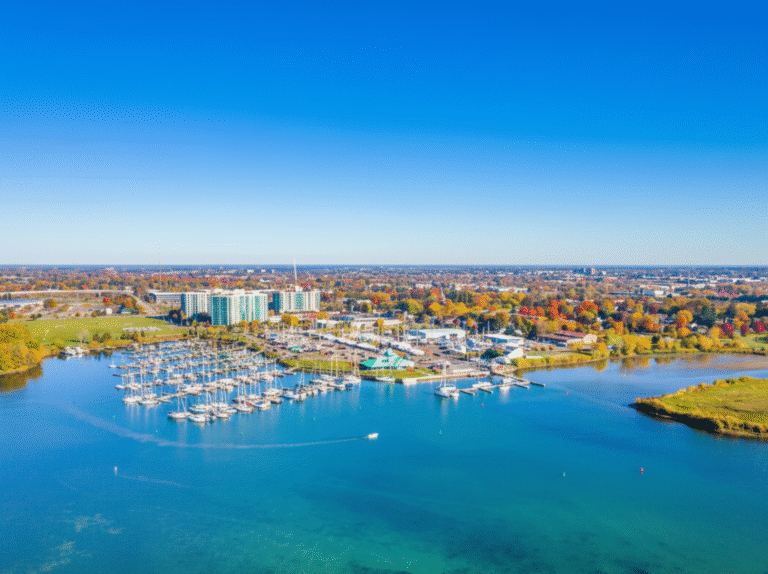 Drone view of Whitby Harbour showing a busy marina and calm blue water on Lake Ontario.